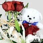 nazan-cicekcilik-seramik-vazoda-kirmizi-guller-ve-lilyumlar-3